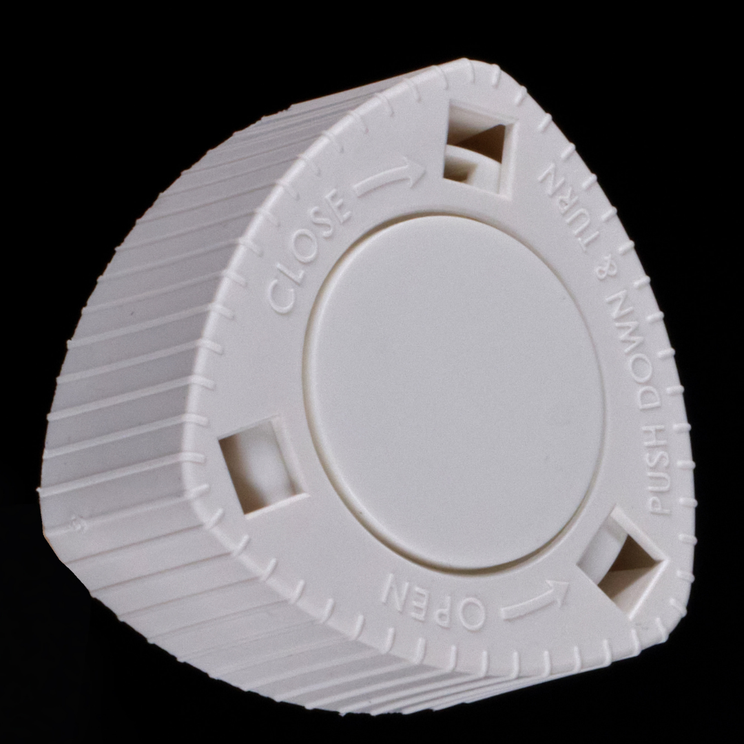 OPEN/CLOSE Instructions are embossed on top of the DialCap.  Push DOWN and TURN  counterclockwise to OPEN; Push DOWN and TURN clockwise to CLOSE; TURN clockwise to SET YOUR NEXT DOSE.